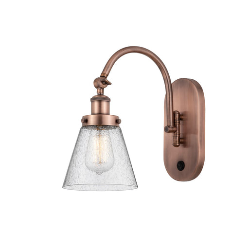 Innovations Cone 6.25in 1-Light Swing Arm Wall Sconce | Industrial Antique Copper Steel and Seedy Glass | Bedroom & Living Room | Model 918-1W-AC-G64