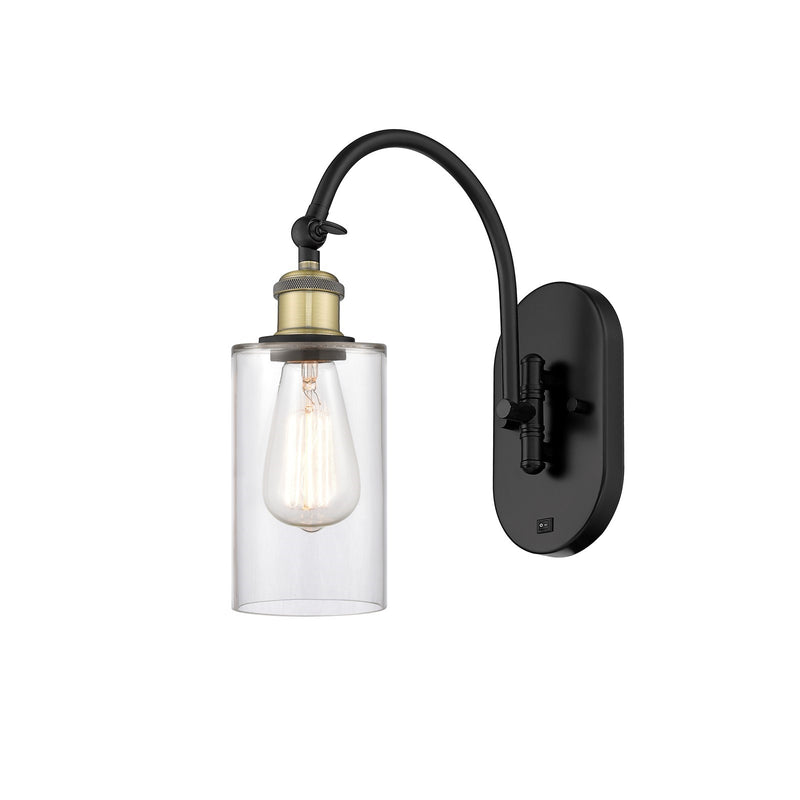Innovations Clymer 4in 1-Light Wall Sconce | Industrial Modern Black Antique Brass and Clear Glass | Bedroom & Hallway Accent | Model 918-1W-BAB-G802