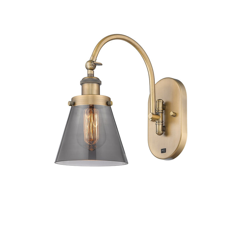 Innovations Cone 6.25in 1-Light Swing Arm Wall Sconce | Industrial Brushed Brass and Light Smoke Glass | Bedroom & Living Room | Model 918-1W-BB-G63