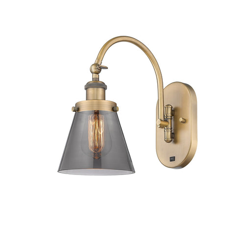 Innovations Cone 6.25in 1-Light Swing Arm Wall Sconce | Industrial Brushed Brass and Light Smoke Glass | Bedroom & Living Room | Model 918-1W-BB-G63