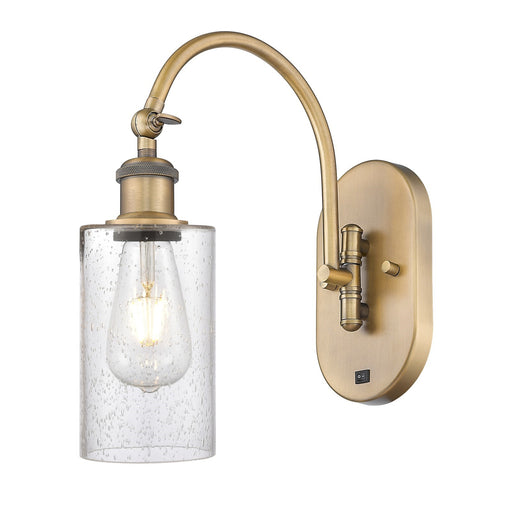 Innovations Clymer 1-Light Wall Sconce | Industrial Brushed Brass Steel and Seedy Glass | Hallway & Bathroom Accent | Model 918-1W-BB-G804