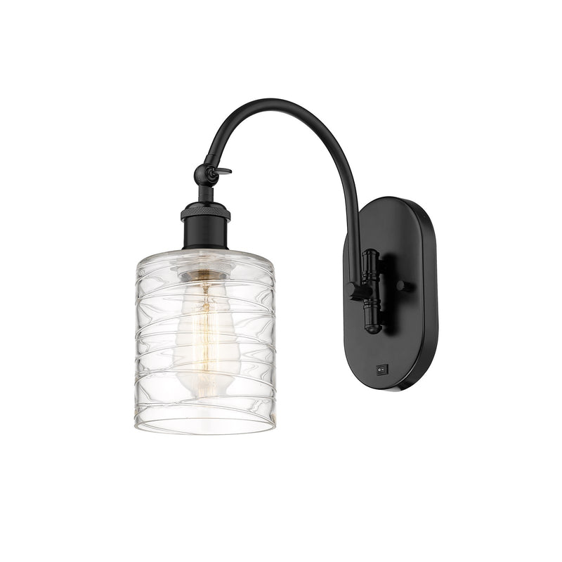 Innovations Cobbleskill 5in 1-Light Wall Sconce | Industrial Matte Black Steel and Cast Brass with Deco Swirl Glass Shade | Model 918-1W-BK-G1113