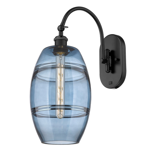 Innovations Vaz 8in 1-Light Wall Sconce | Industrial Matte Black Steel and Blue Glass | Bedroom & Hallway Accent | 8 x 19 in | Model 918-1W-BK-G557-8BL