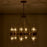 Kalco Lighting Duet 12 Light Chandelier, Vintage Brass