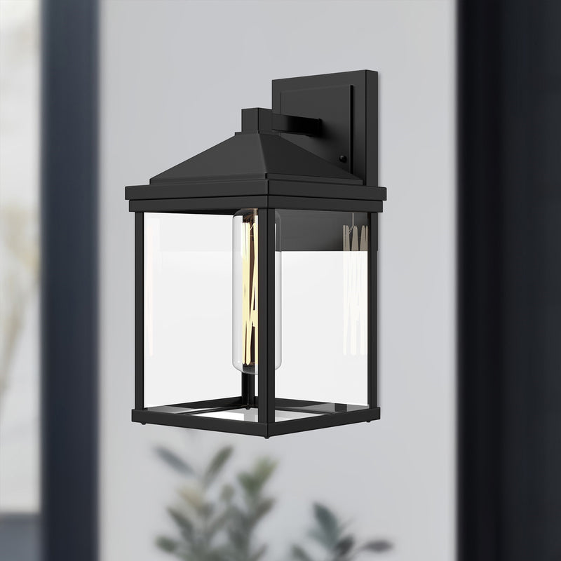 Kuzco Larchmont 6in 1-Light Exterior Wall Sconce | Clear Glass and Textured Black Aluminum | Entryway & Covered Porch | Model EW552007BKCL