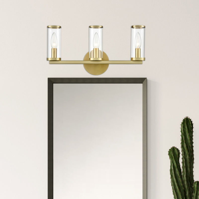 Kuzco Revolve 3-Light Wall/Vanity | Natural Brass and Clear Glass | Bathroom Vanity & Powder Room | 17.62 x 8.62 x 4 in | Model WV309033NBCG