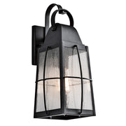 Kichler Tolerand 1-Light Outdoor Wall Sconce | Traditional Textured Black and Clear Seeded Glass | Entryway & Covered Porch | Model 49553BKT