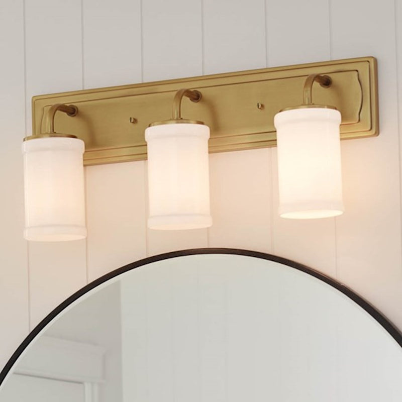 Kichler Vetivene 24in 3-Light Bath Vanity Light | Transitional Natural Brass and Opal Glass | Bathroom & Powder Room | Model 55131NBR