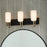 Kichler Solia 24in 3-Light Vanity Light | Champagne Bronze & Black with Opal Glass | Bathroom Vanity Light | Dimmable | Model 55163CPZ