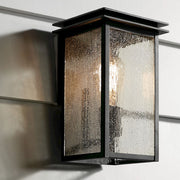 Kichler Arkville 10in 1-Light Outdoor Wall Sconce | Textured Black Aluminum and Clear Seeded Glass | Covered Patio & Entryway | Model 59540BKT