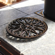 Minuteman International 7in Sunburst Cast Iron Trivet | Black Porcelain Enamel | Kitchen & Dining Room Heat Protection | 7 x 0.5 x 7 in | Model C-33BK