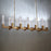 Modern Forms Cinema 12 light 54" LED Chandelier/3500K, Aged Brass