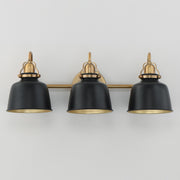 Maxim Hollis 24in 3-Light Wall Sconce | Farmhouse Natural Aged Brass and Glossy Black Steel | Bathroom & Hallway | 24 x 9 in | Model 21423BKNAB