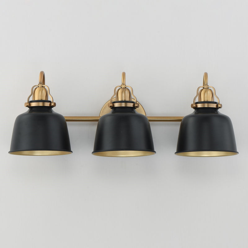 Maxim Hollis 24in 3-Light Wall Sconce | Farmhouse Natural Aged Brass and Glossy Black Steel | Bathroom & Hallway | 24 x 9 in | Model 21423BKNAB