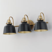 Maxim Hollis 24in 3-Light Wall Sconce | Farmhouse Natural Aged Brass and Glossy Black Steel | Bathroom & Hallway | 24 x 9 in | Model 21423BKNAB