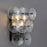 Maxim Lighting Loren 3 Light Wall Sconce, Gunmetal/Textured Clear