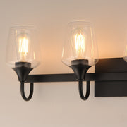 Maxim Lighting Goblet 28in 4-Light Vanity Light | Modern Black and Clear Glass | Bathroom Vanity & Powder Room | 28.25 x 8.75 in | Model 26134CLBK