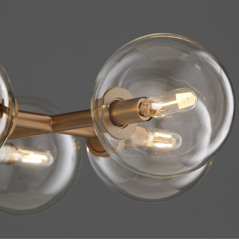 Quorum Rovi 8 Light Linear Chandelier, Aged Brass/Clear