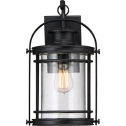 Quoizel Booker 9in 1-Light Outdoor Wall Sconce | Traditional Mystic Black and Clear Seedy Glass | Porch & Entryway | 9 x 8.5 x 15 in | Model BKR8408K