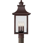Quoizel Chancellor 21.75in 3-Light Outdoor Wall Lantern | Traditional Copper Bronze and Clear Glass | Entryway & Porch | Model CCR9010CU