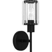 Quoizel Isla 5in 1-Light Wall Sconce | Modern Matte Black and Clear Crystal Glass | Bedroom & Vanity | 5.5 x 4.75 x 17 in | Model PCILA8605MBK