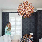 Quoizel Ribbons 23in 12-Light Pendant | Modern Satin Copper Swirl Metal | Dining Room & Entryway | 23 x 23 in | Model RBN2823SG