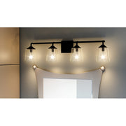 Quoizel Thoresby 31in 4-Light Vanity Light | Modern Matte Black and Clear Glass | Bathroom Vanity & Guest Bath | 31 x 5.25 x 8 in | Model THO8631MBK