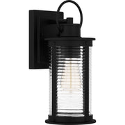 Quoizel Tilmore 7in 1-Light Outdoor Wall Lantern | Coastal Matte Black and Clear Ribbed Glass | Front Porch & Entryway | Model TLM8405MBK