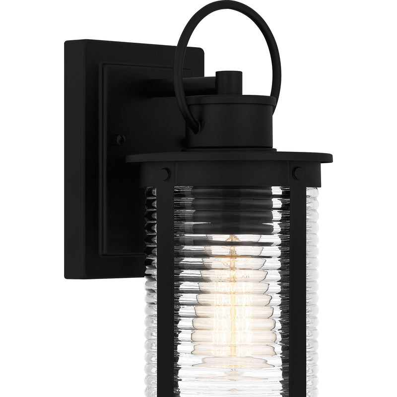 Quoizel Tilmore 7in 1-Light Outdoor Wall Lantern | Coastal Matte Black and Clear Ribbed Glass | Front Porch & Entryway | Model TLM8405MBK