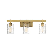 Savoy House Baxter 24in 3-Light Vanity Light | Modern Warm Brass and Clear Hammered Glass | Bathroom Vanity | 24 x 5.13 x 9 in | Model L8-6090-3-322