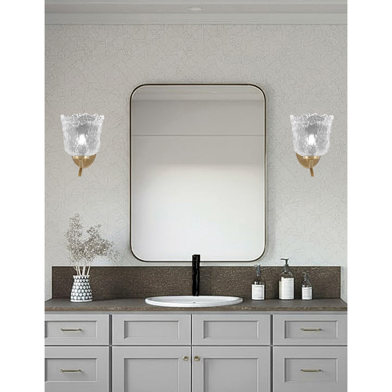 Toltec Kurve 7in 1-Light Uplight Wall Sconce | New Age Brass and Clear Lava Glass | Bedroom & Hallway Accent | 7 x 9 x 9.5 in | Model 3721-NAB-4230