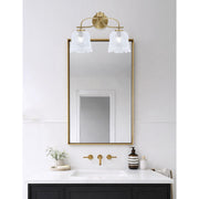Toltec Cavella 12.5in 2-Light Bath Vanity Light | Modern New Age Brass and Clear Lava Glass | Bathroom Vanity & Mirror Lighting | 8.5 x 12.5 in | Model 3912-NAB-4230