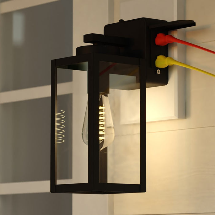 Vaxcel Lombard 1Lt 5" Outdoor Wall Light/GFCI Outlet Black/Clear Glass