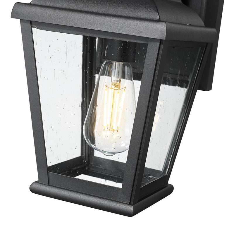 Z-Lite Raphael 1 Light Outdoor Wall Light, Sand Black/Clear Seedy