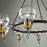 Artcraft Martina Chandelier, Black/Brushed Brass/Clear