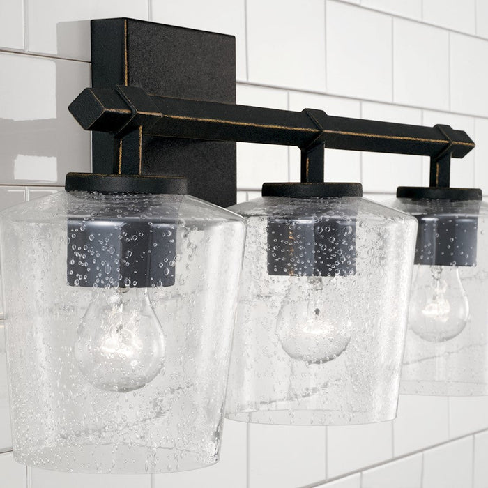 Capital Lighting Ogden 3 Light Vanity, Black Iron/Clear Seeded