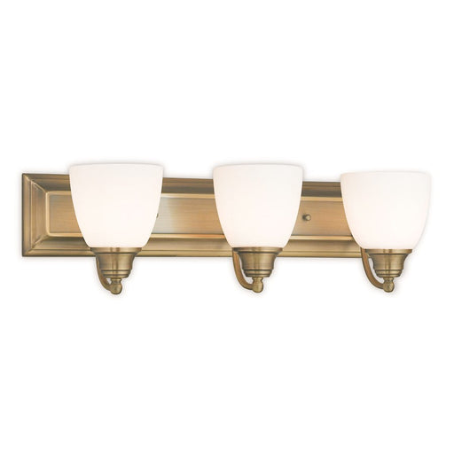 Livex Springfield 3 Light Bath Vanity, Antique Brass/Satin Opal White - 10503-01