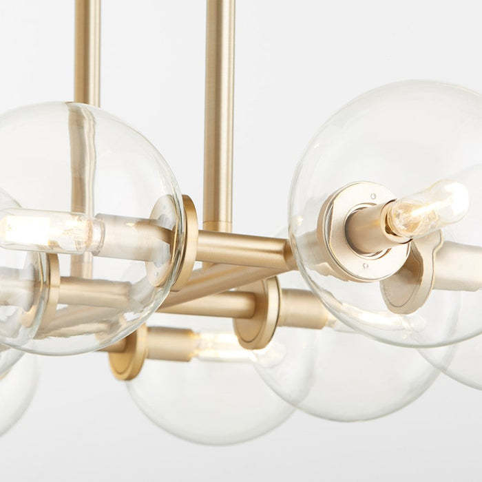 Quorum Rovi 8 Light Linear Chandelier, Aged Brass/Clear